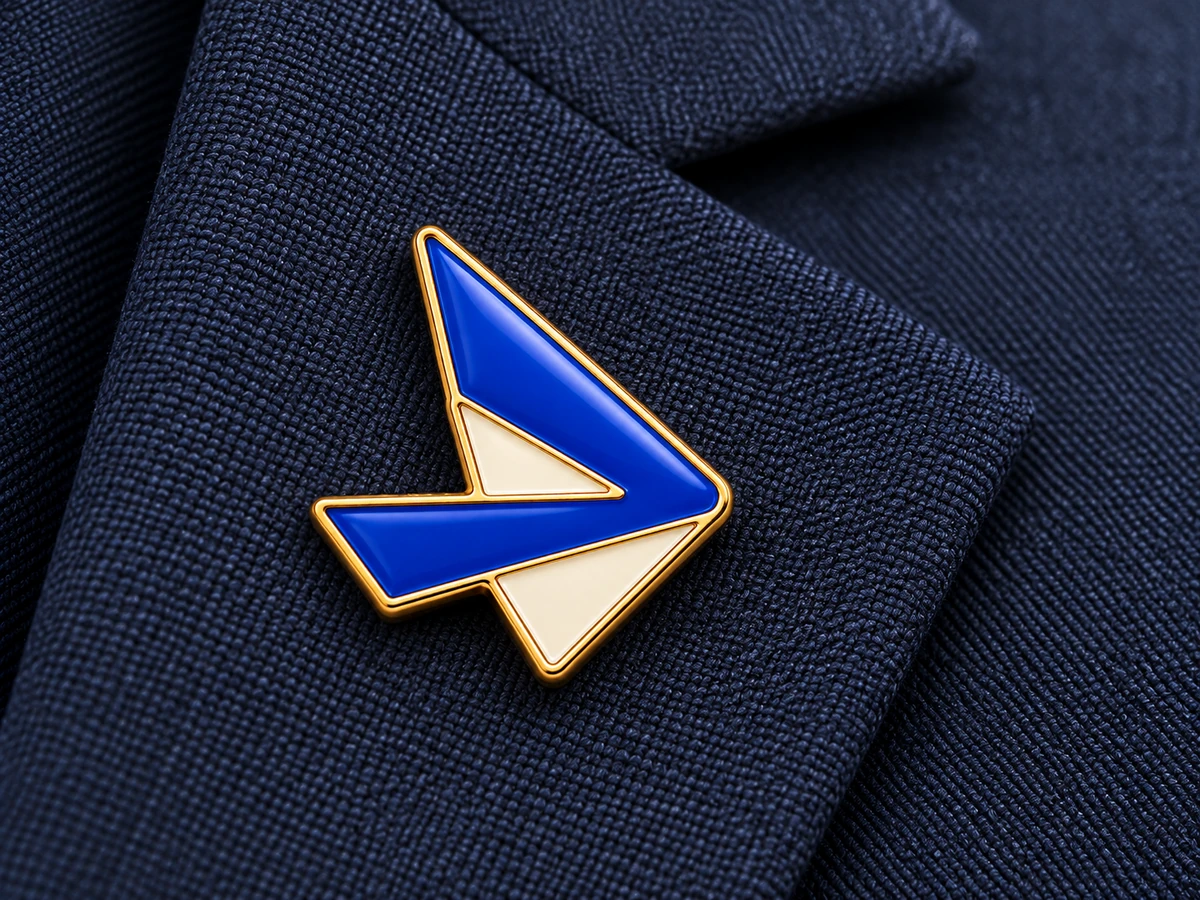 P01 angular pin worn on a navy lapel