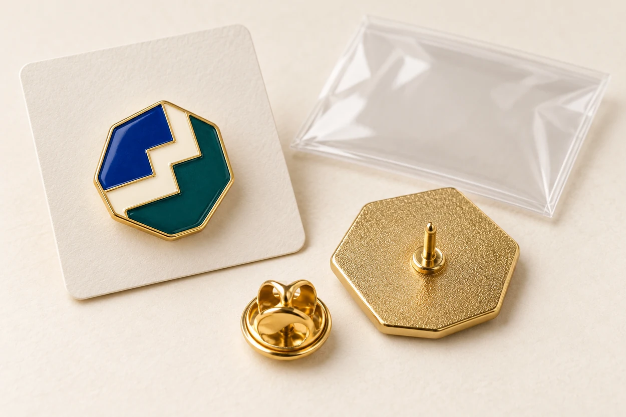 Illustrative blue and teal stepped enamel pin: connection packing review.